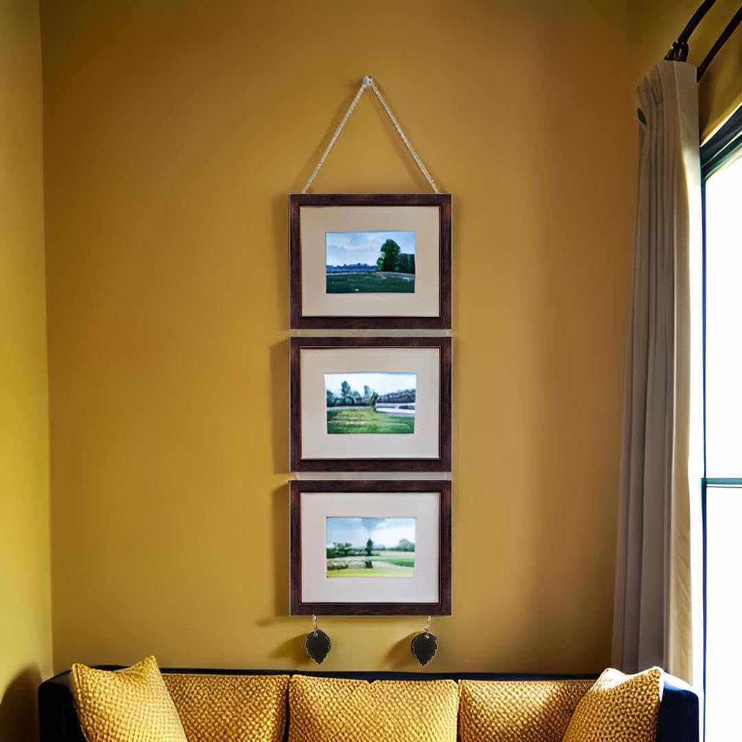 Pack of 3 Dev Aastha hanging photo frames, 5x7 inches, displayed on a wall.