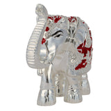 Silver elephant idol with intricate detailing, handcrafted from synthetic resin, ideal for gifting and spiritual decor.